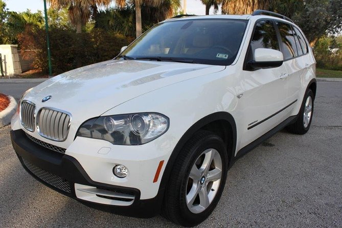 Private Round Trip Airport (UVF) Transfer: Luxury SUV - Drinks, snacks, and special arrivals